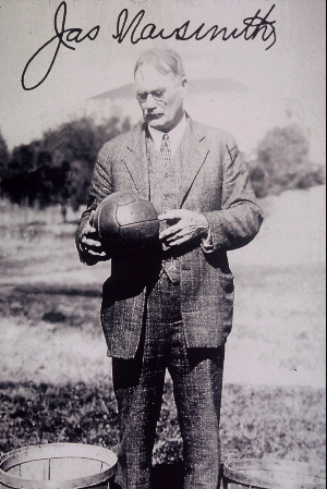 [photo:
James Naismith with basketball. All rights reserved. Kansas Heritage Group.